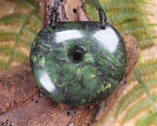 Porowhita carved from Douglas Creek Pounamu - NZ Greenstone