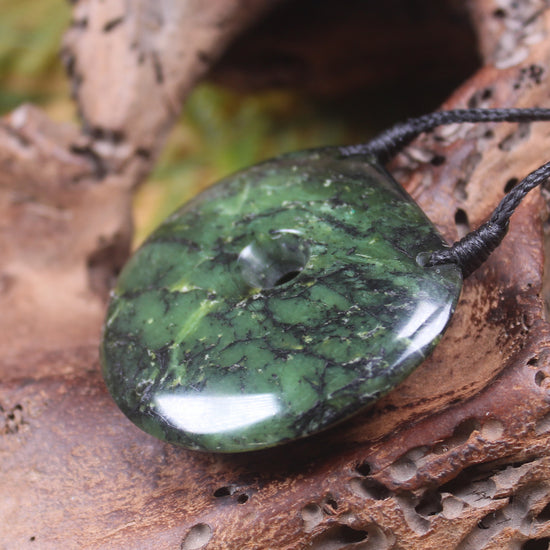 Porowhita carved from Douglas Creek Pounamu - NZ Greenstone