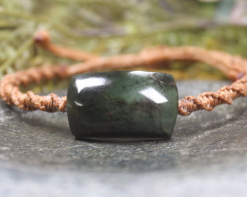 Adjustable cord bracelet with Rimu Pounamu
