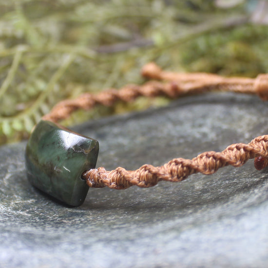 Adjustable cord bracelet with Rimu Pounamu