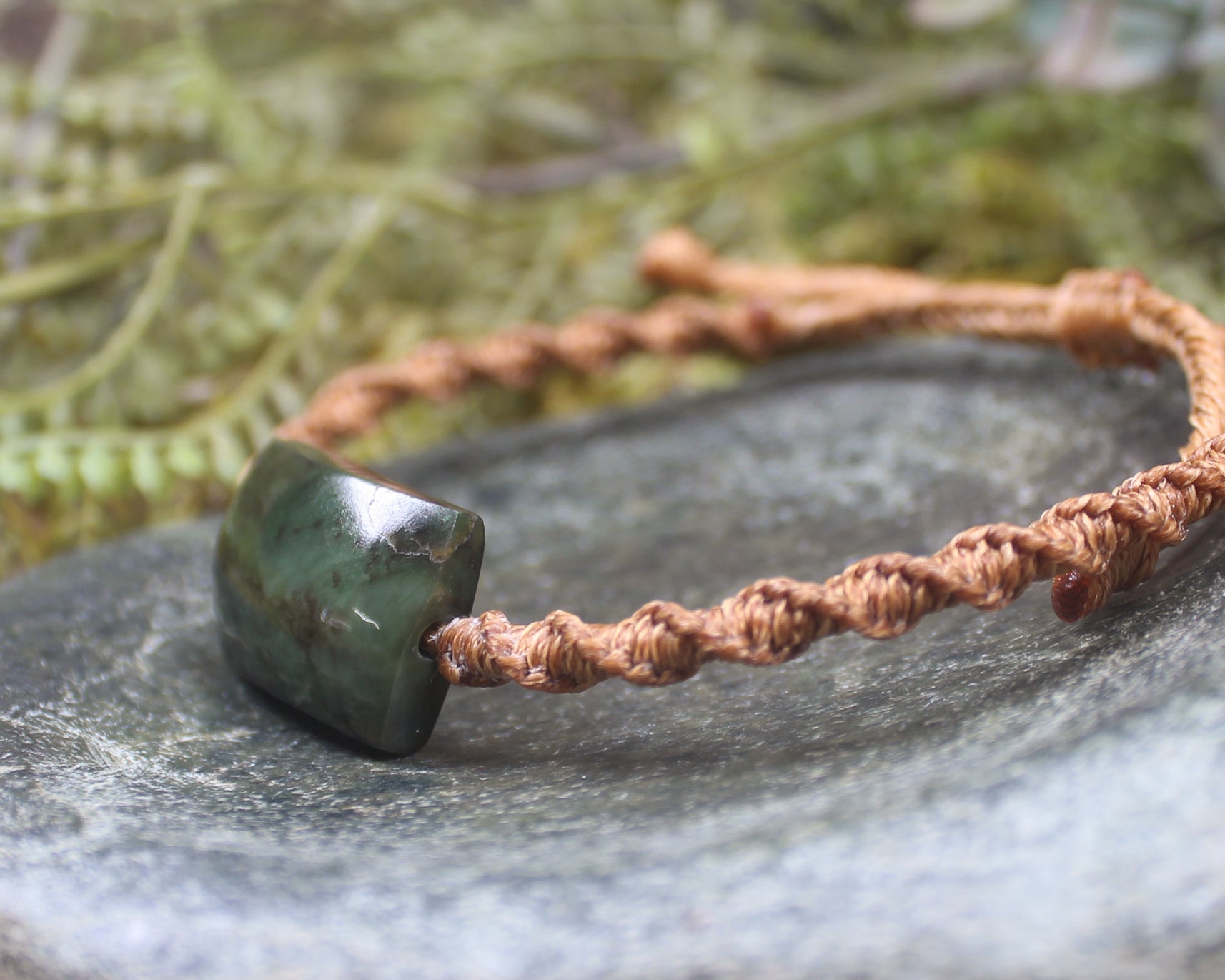 Adjustable cord bracelet with Rimu Pounamu