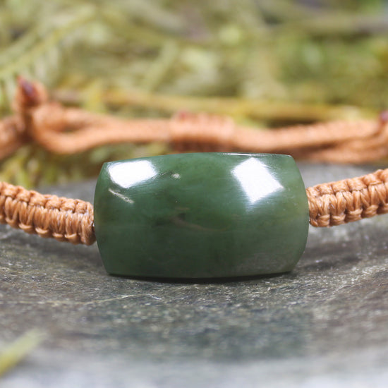 Adjustable cord bracelet with Hapopo Pounamu