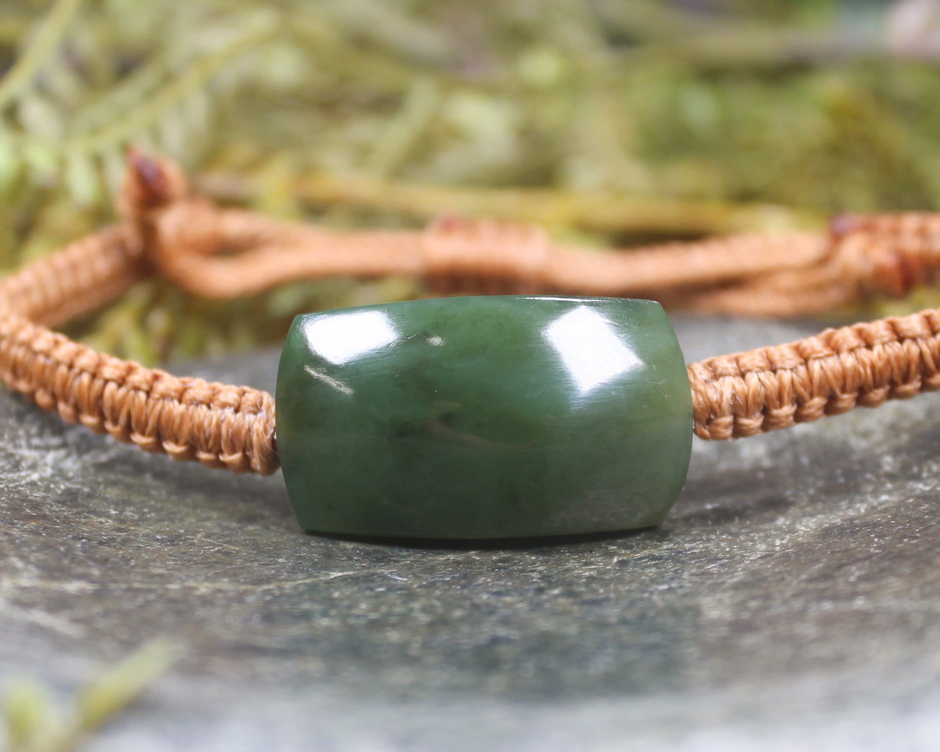 Adjustable cord bracelet with Hapopo Pounamu