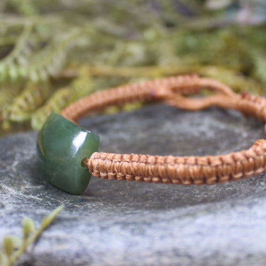 Adjustable cord bracelet with Hapopo Pounamu