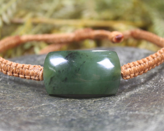 Adjustable cord bracelet with Hapopo Pounamu