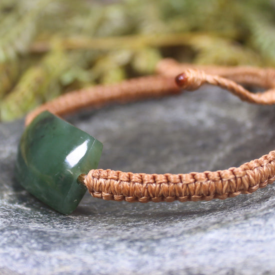 Adjustable cord bracelet with Hapopo Pounamu