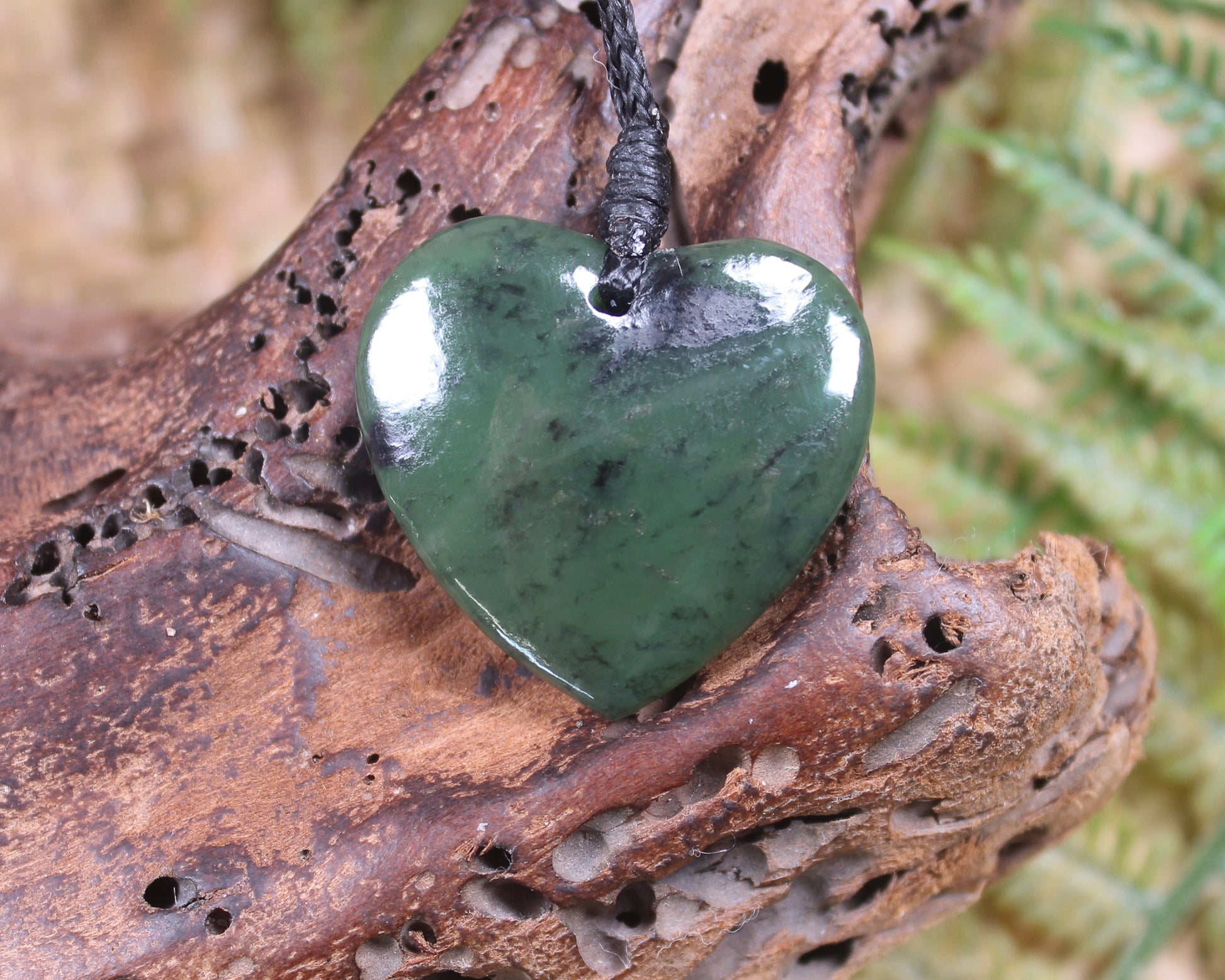 Heart with Koru carved from Hapopo Pounamu - NZ Greenstone