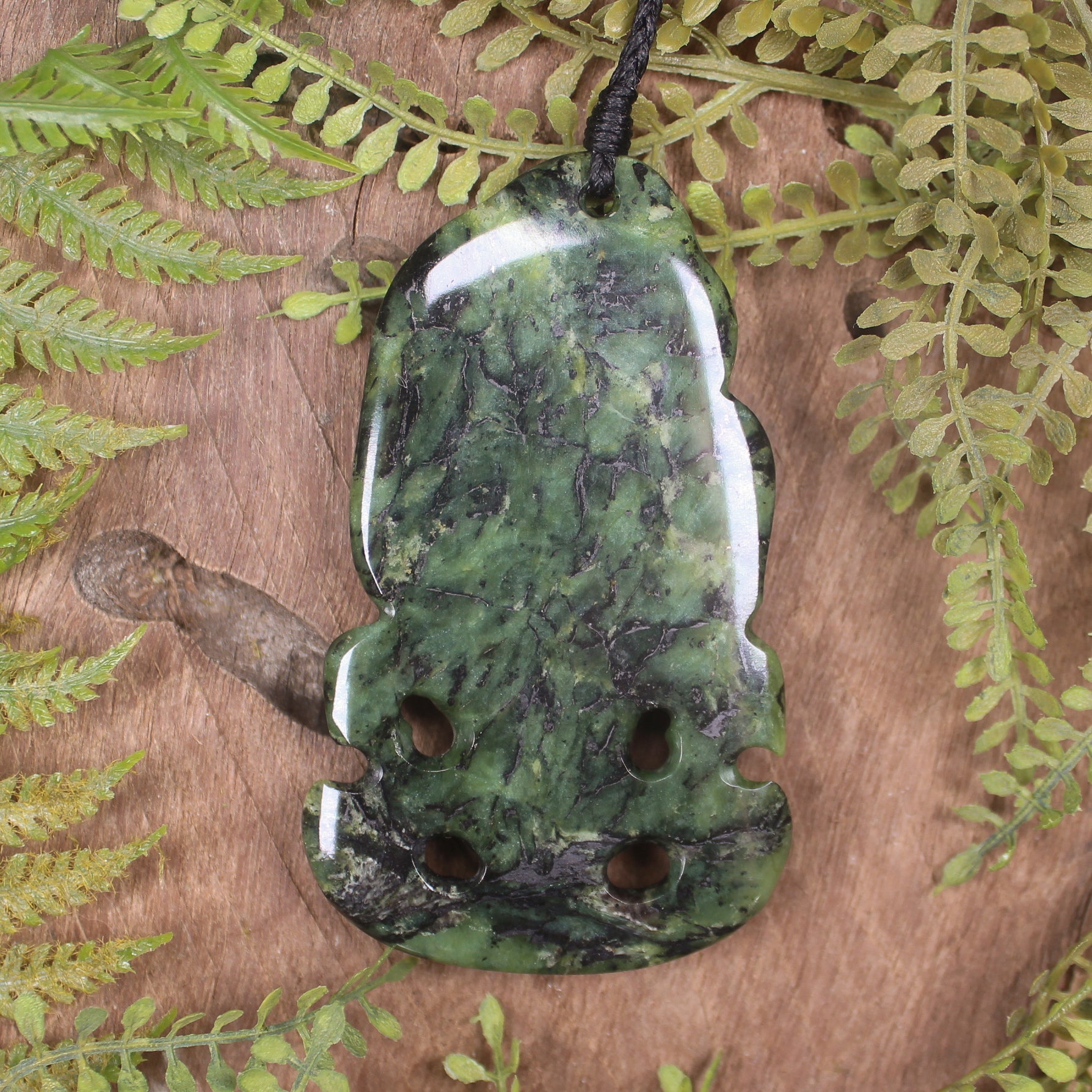 Hei Tiki carved from Douglas Creek Pounamu - NZ Greenstone