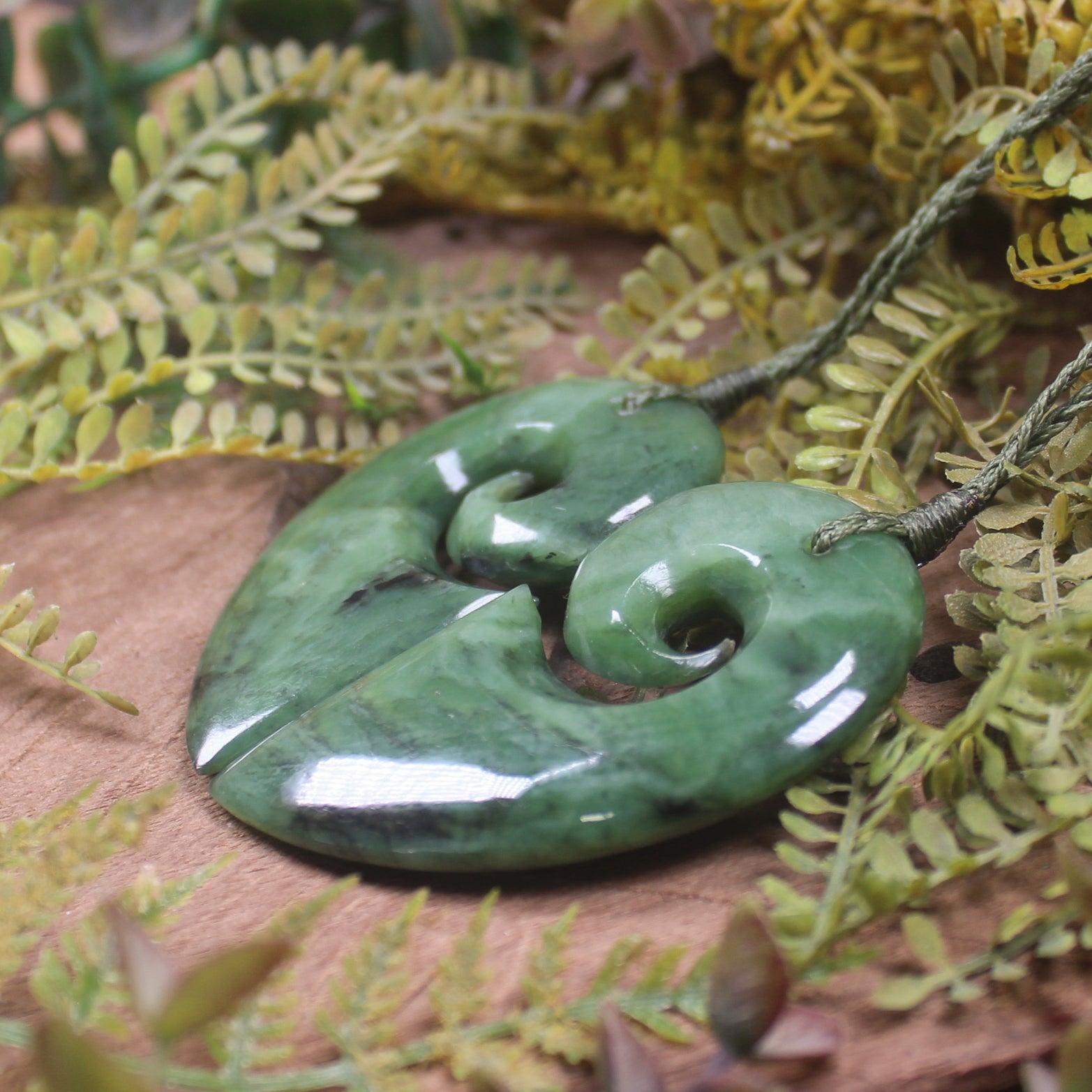 Koru Heart pendant carved from Hapopo Pounamu - NZ Greenstone