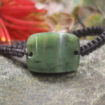 Adjustable cord bracelet with Hapopo Pounamu