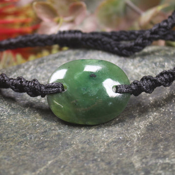 Adjustable cord bracelet with Kawakawa Pounamu