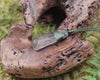 Toki pendant carved from Smokey Quartz