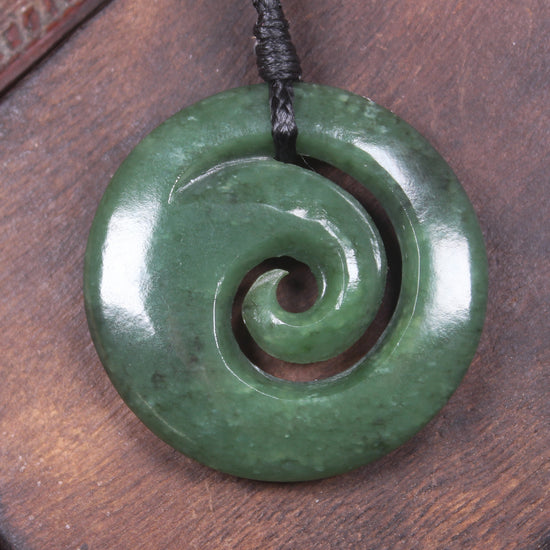 Koru pendant carved from Kawakawa Pounamu - NZ Greenstone