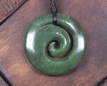 Koru pendant carved from Kawakawa Pounamu - NZ Greenstone