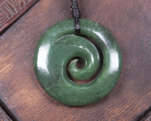 Koru pendant carved from Kawakawa Pounamu - NZ Greenstone