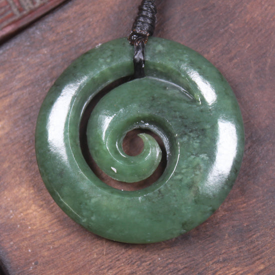 Koru pendant carved from Kawakawa Pounamu - NZ Greenstone