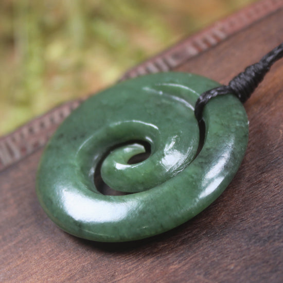 Koru pendant carved from Kawakawa Pounamu - NZ Greenstone