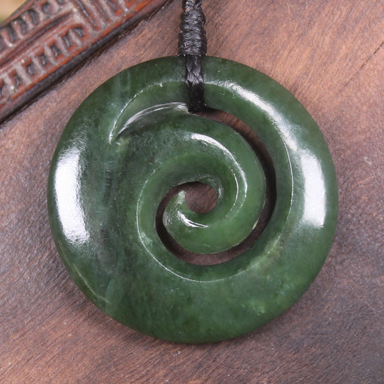 Koru pendant carved from Kawakawa Pounamu - NZ Greenstone