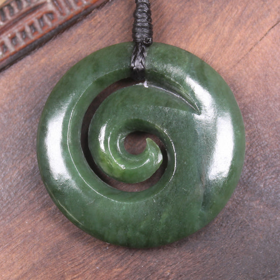 Koru pendant carved from Kawakawa Pounamu - NZ Greenstone