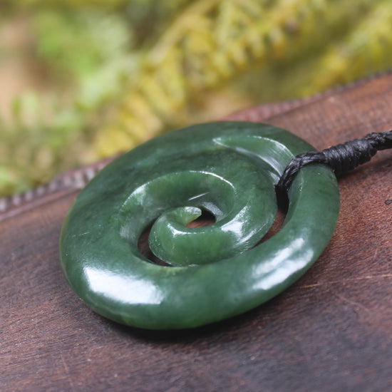 Koru pendant carved from Kawakawa Pounamu - NZ Greenstone