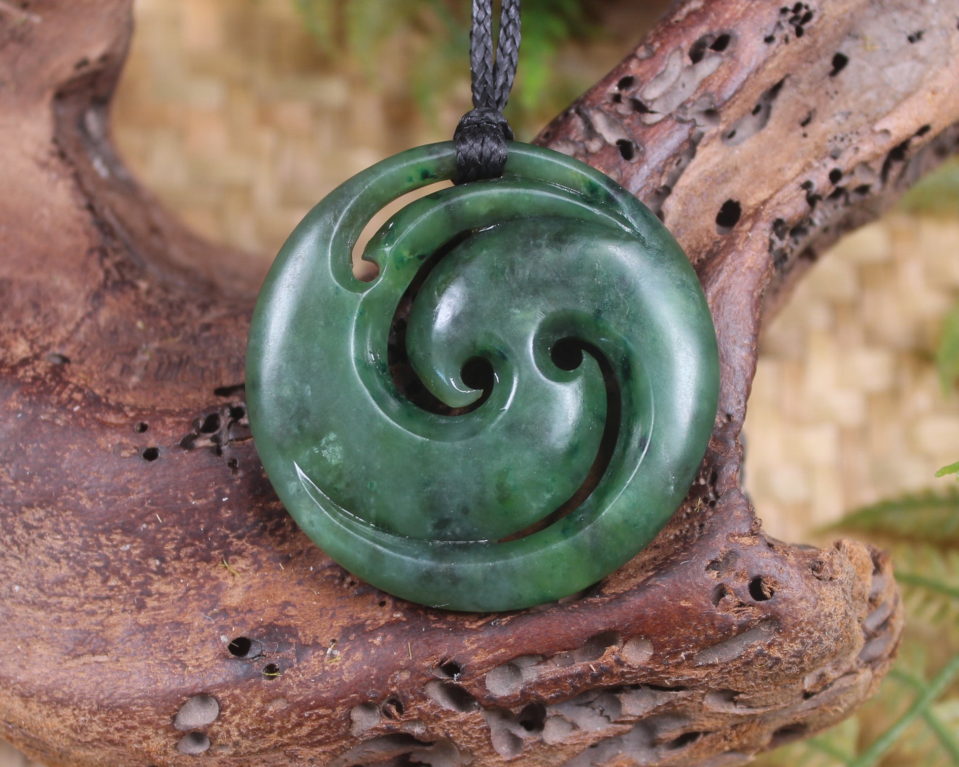 Koru pendant carved from Kawakawa Pounamu - NZ Greenstone