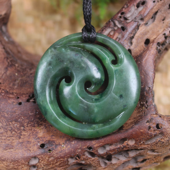 Koru pendant carved from Kawakawa Pounamu - NZ Greenstone