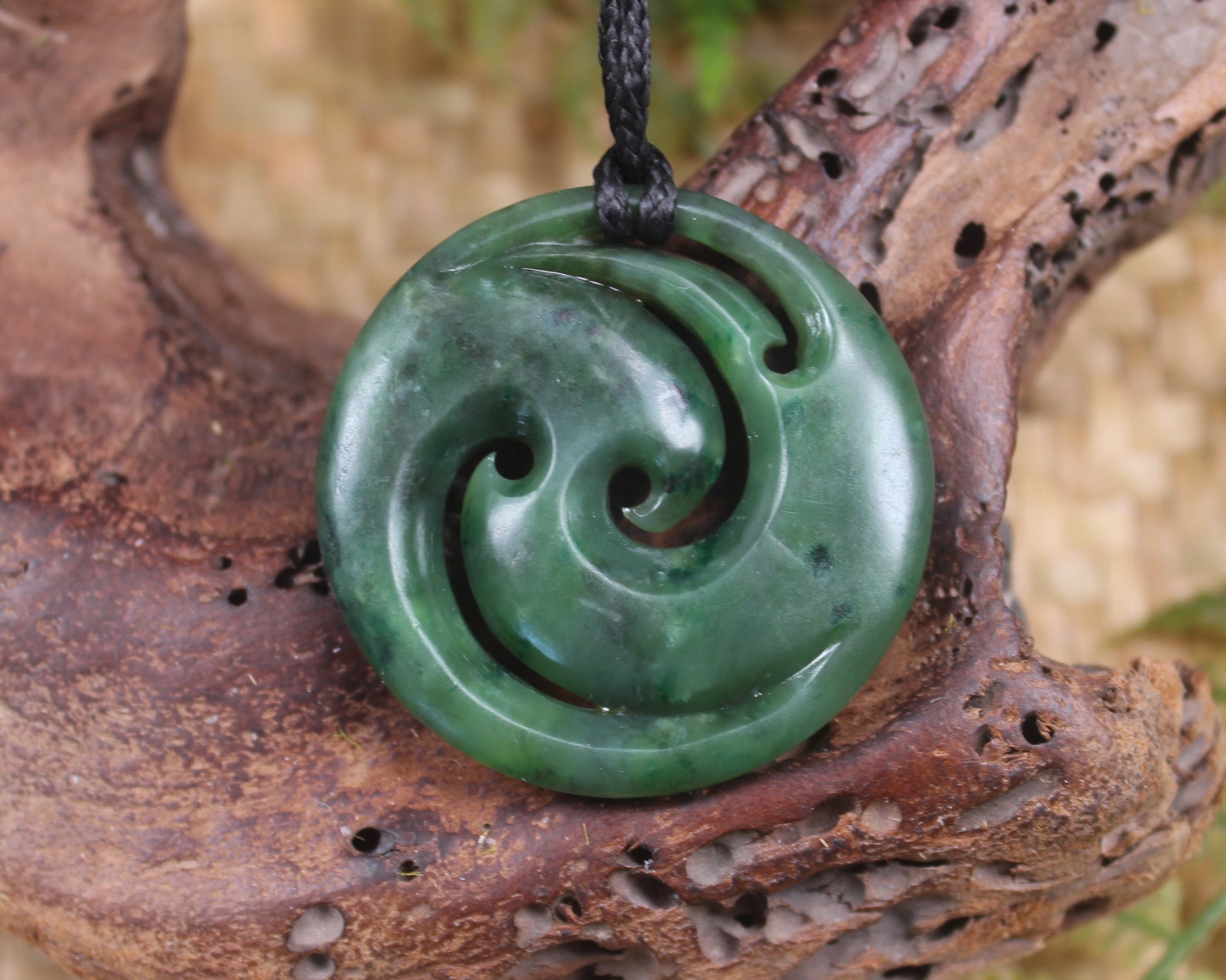 Koru pendant carved from Kawakawa Pounamu - NZ Greenstone
