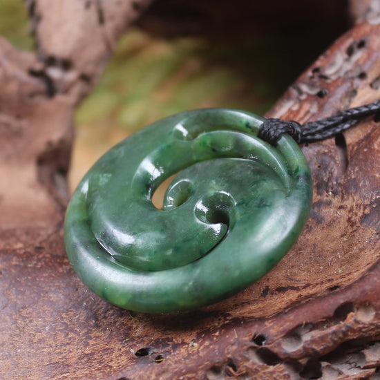 Koru pendant carved from Kawakawa Pounamu - NZ Greenstone