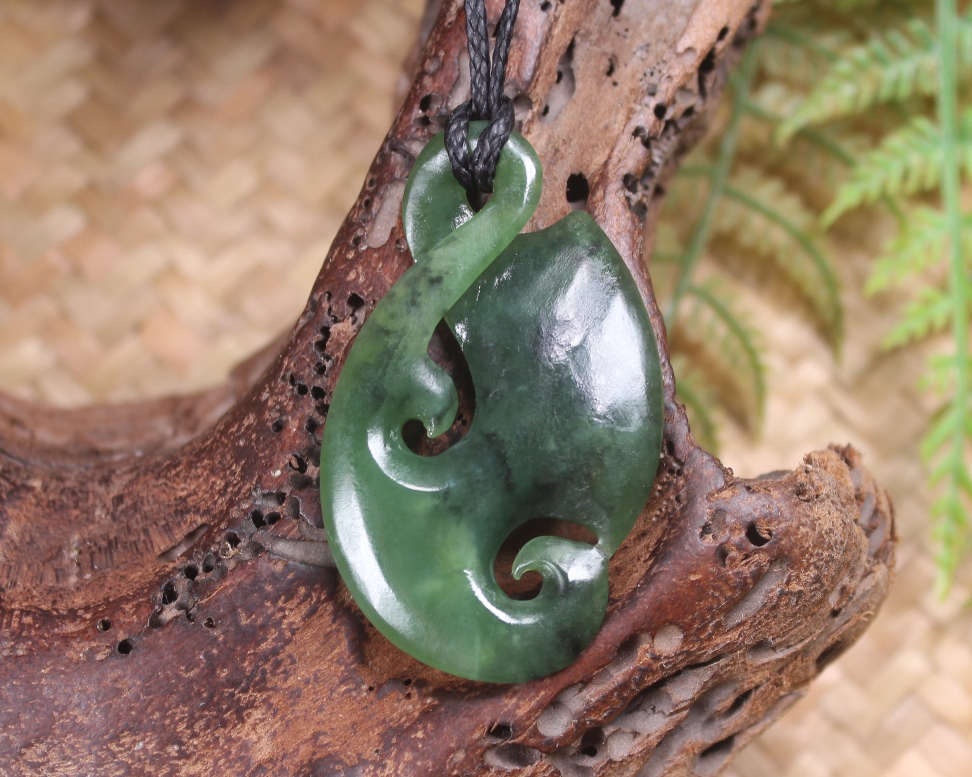Koru Twist Pendant carved from Hapopo Pounamu - NZ Greenstone