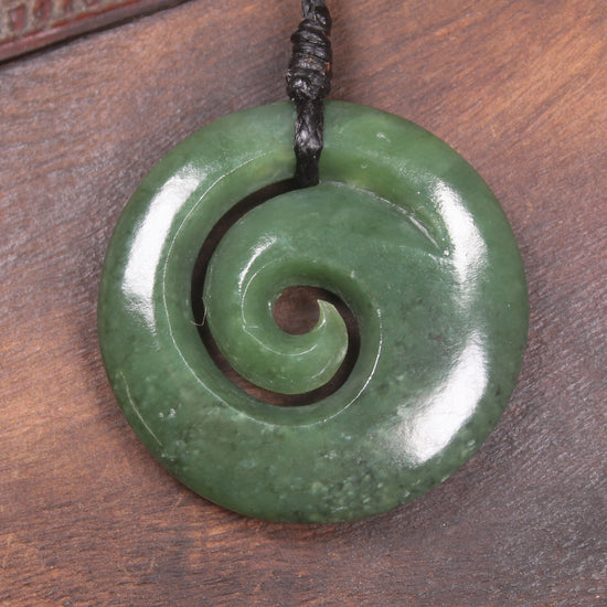 Koru pendant carved from Kawakawa Pounamu - NZ Greenstone