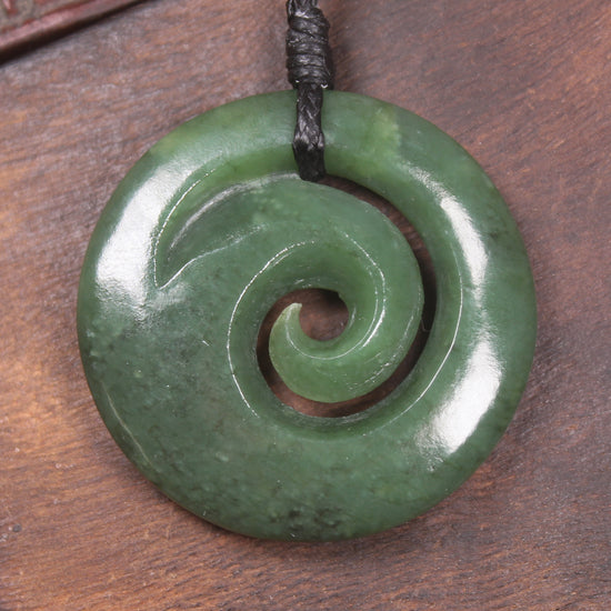 Koru pendant carved from Kawakawa Pounamu - NZ Greenstone
