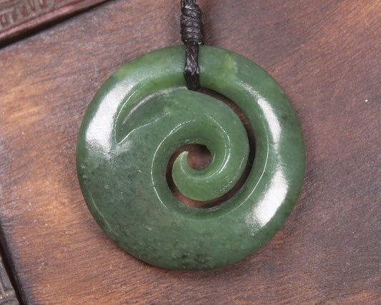Koru pendant carved from Kawakawa Pounamu - NZ Greenstone