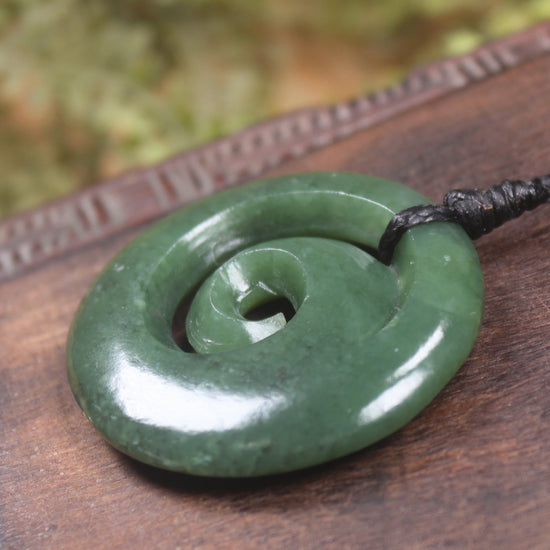 Koru pendant carved from Kawakawa Pounamu - NZ Greenstone