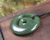 Koru pendant carved from Kawakawa Pounamu - NZ Greenstone