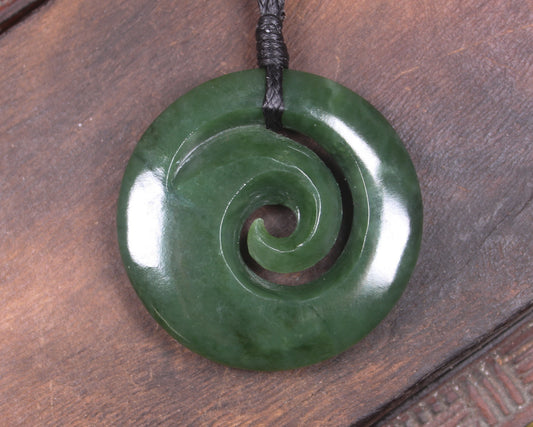 Koru pendant carved from Kawakawa Pounamu - NZ Greenstone