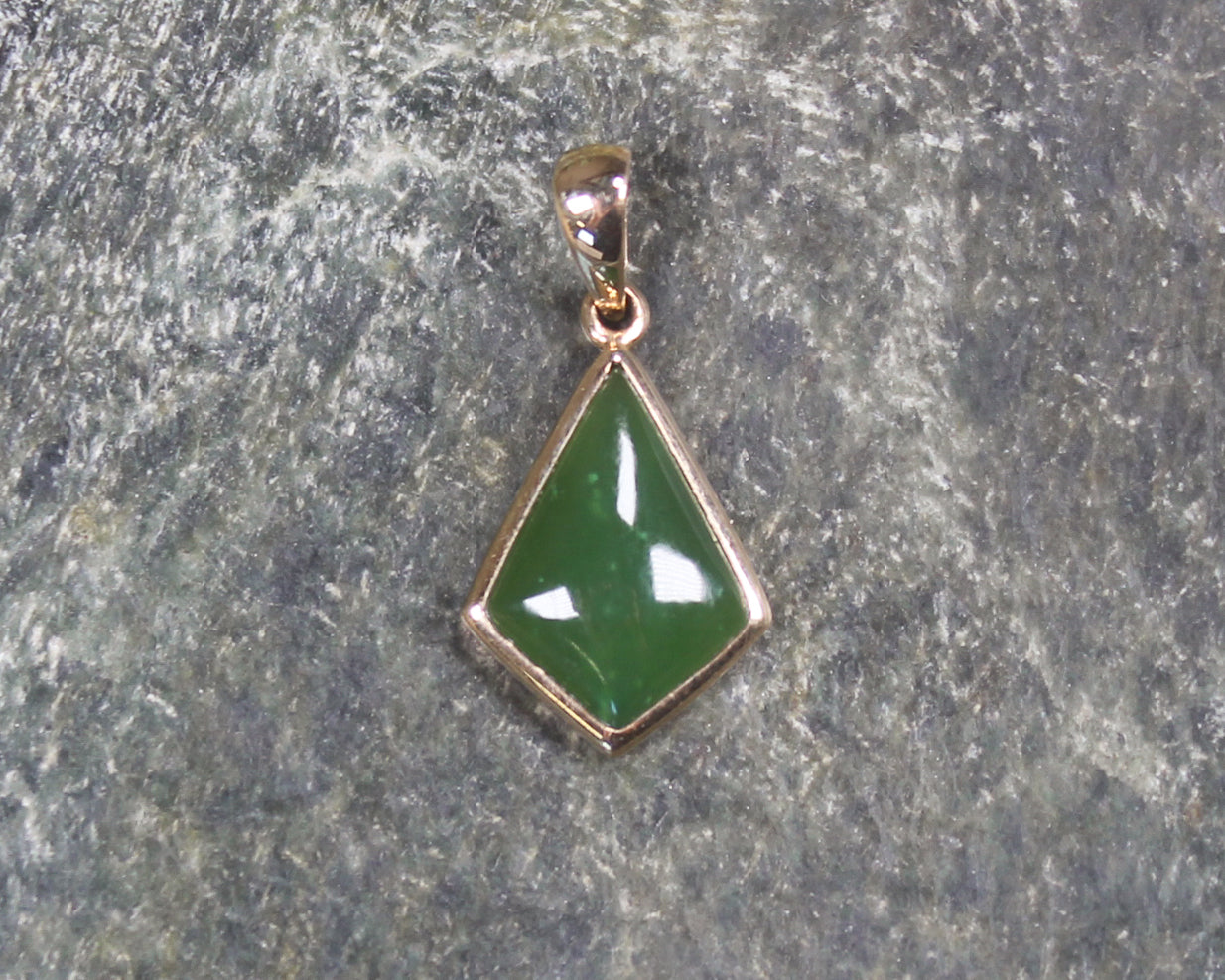 Kawakawa Pounamu pendant with a gold plated setting - NZ Greenstone