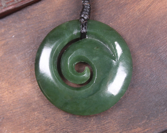 Koru pendant carved from Kawakawa Pounamu - NZ Greenstone