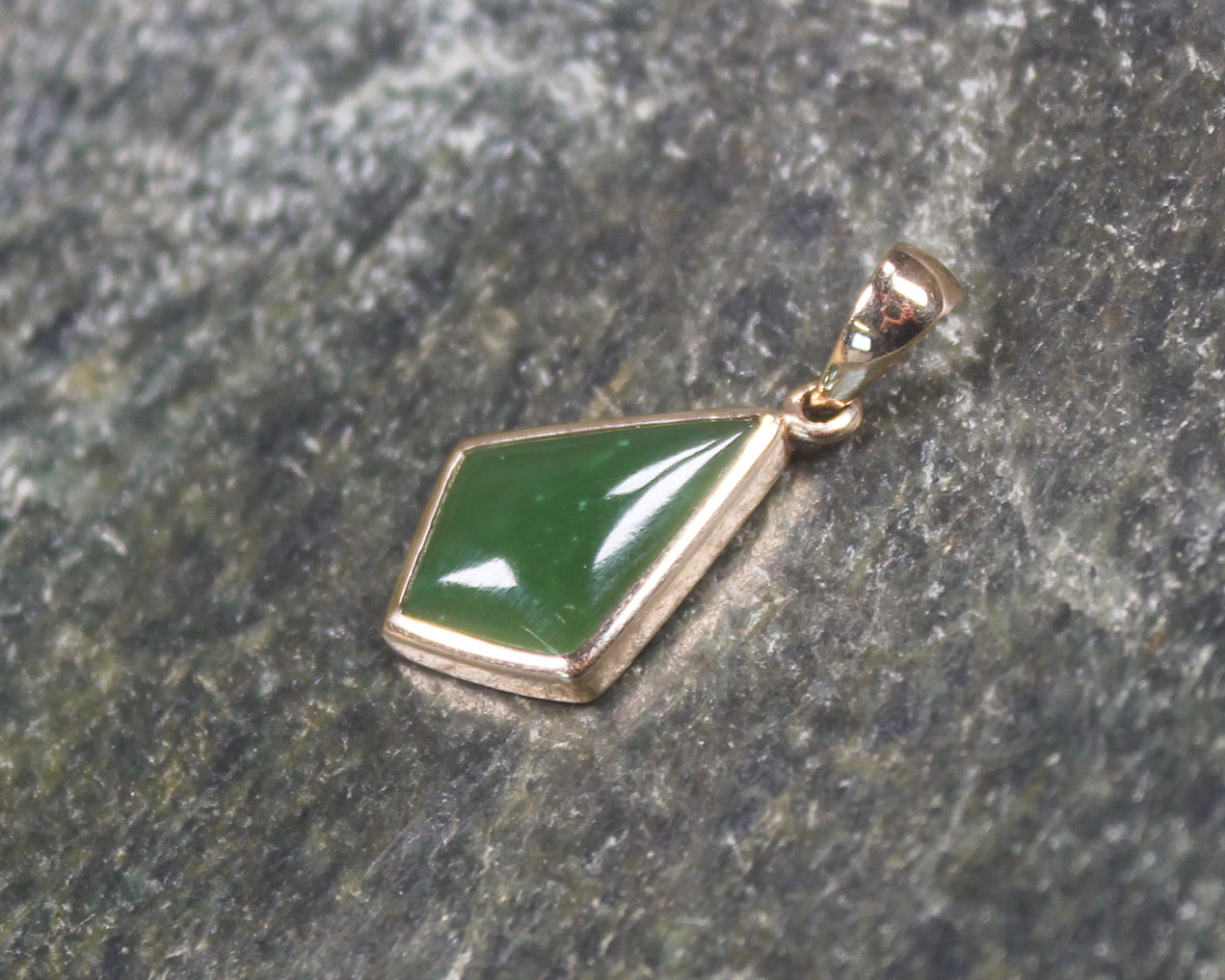 Kawakawa Pounamu pendant with a gold plated setting - NZ Greenstone