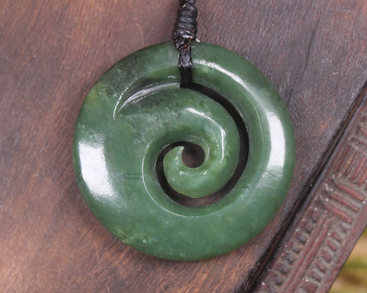 Koru pendant carved from Kawakawa Pounamu - NZ Greenstone