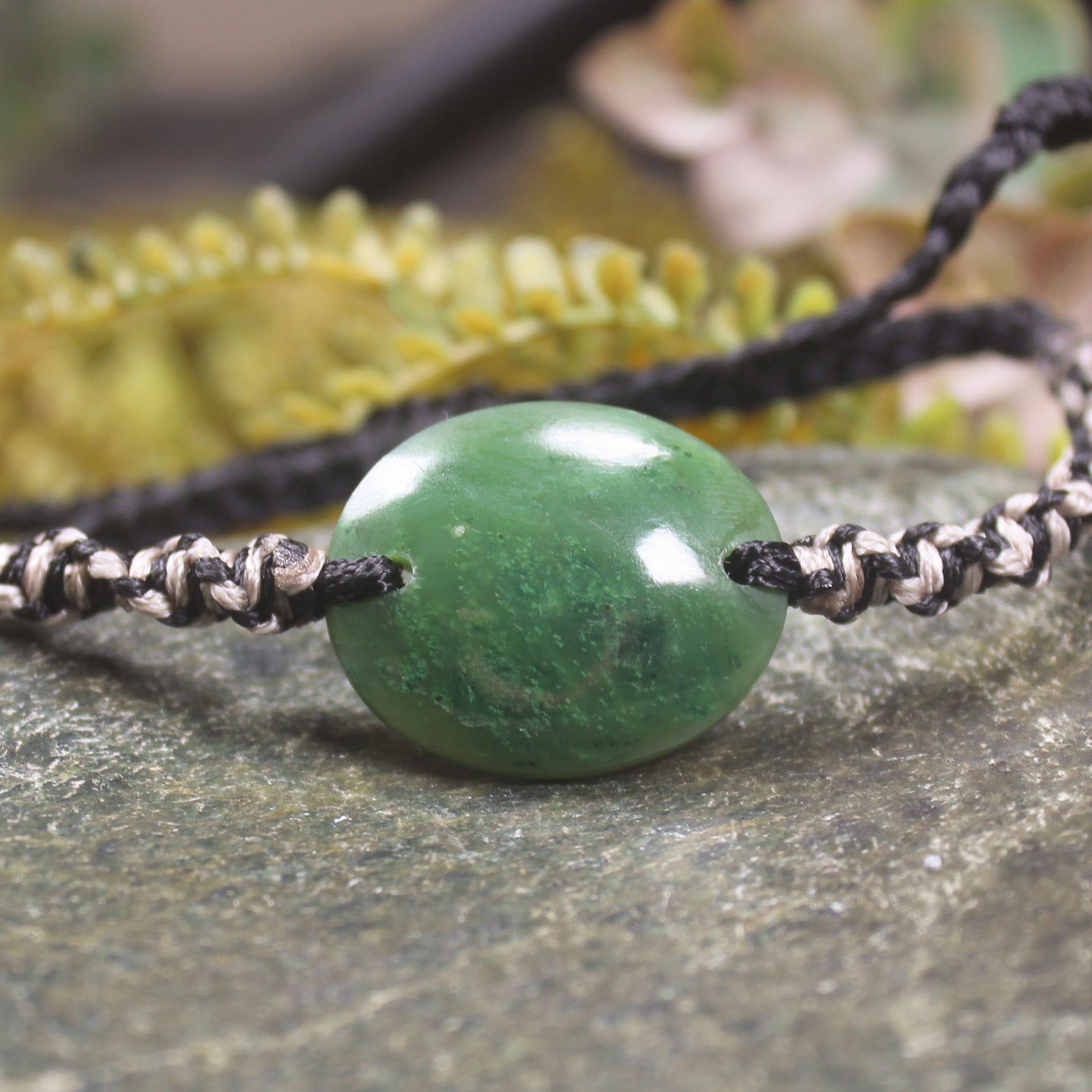 Adjustable cord bracelet with Hapopo Pounamu