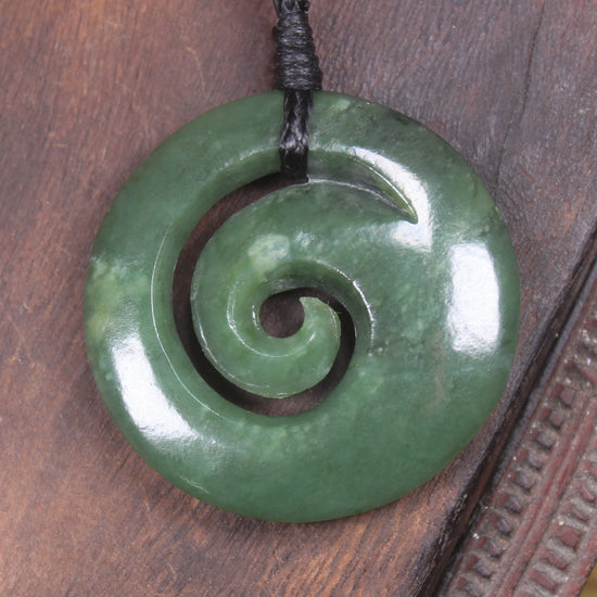 Koru pendant carved from Kawakawa Pounamu - NZ Greenstone