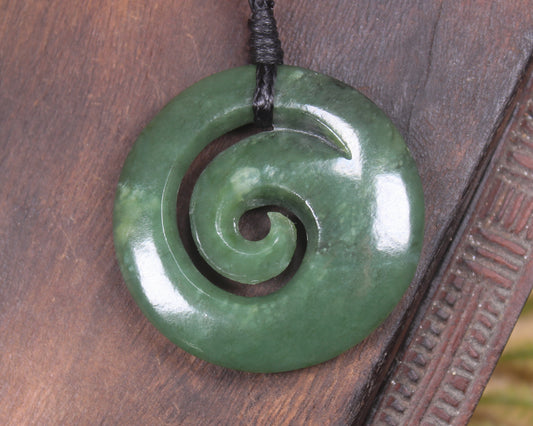 Koru pendant carved from Kawakawa Pounamu - NZ Greenstone