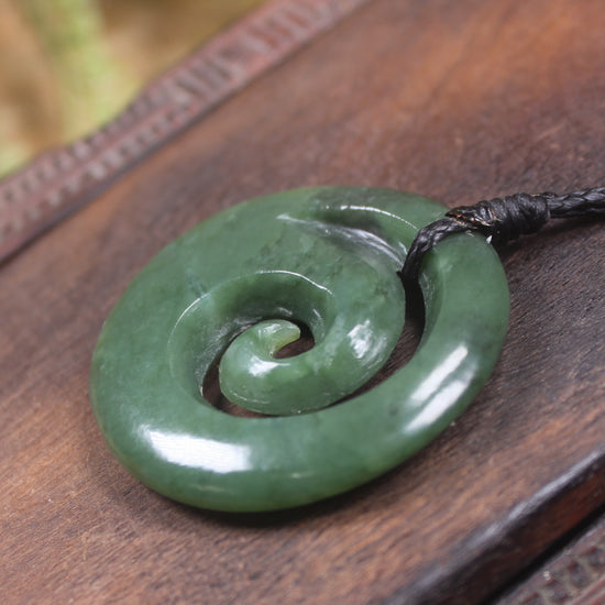 Koru pendant carved from Kawakawa Pounamu - NZ Greenstone