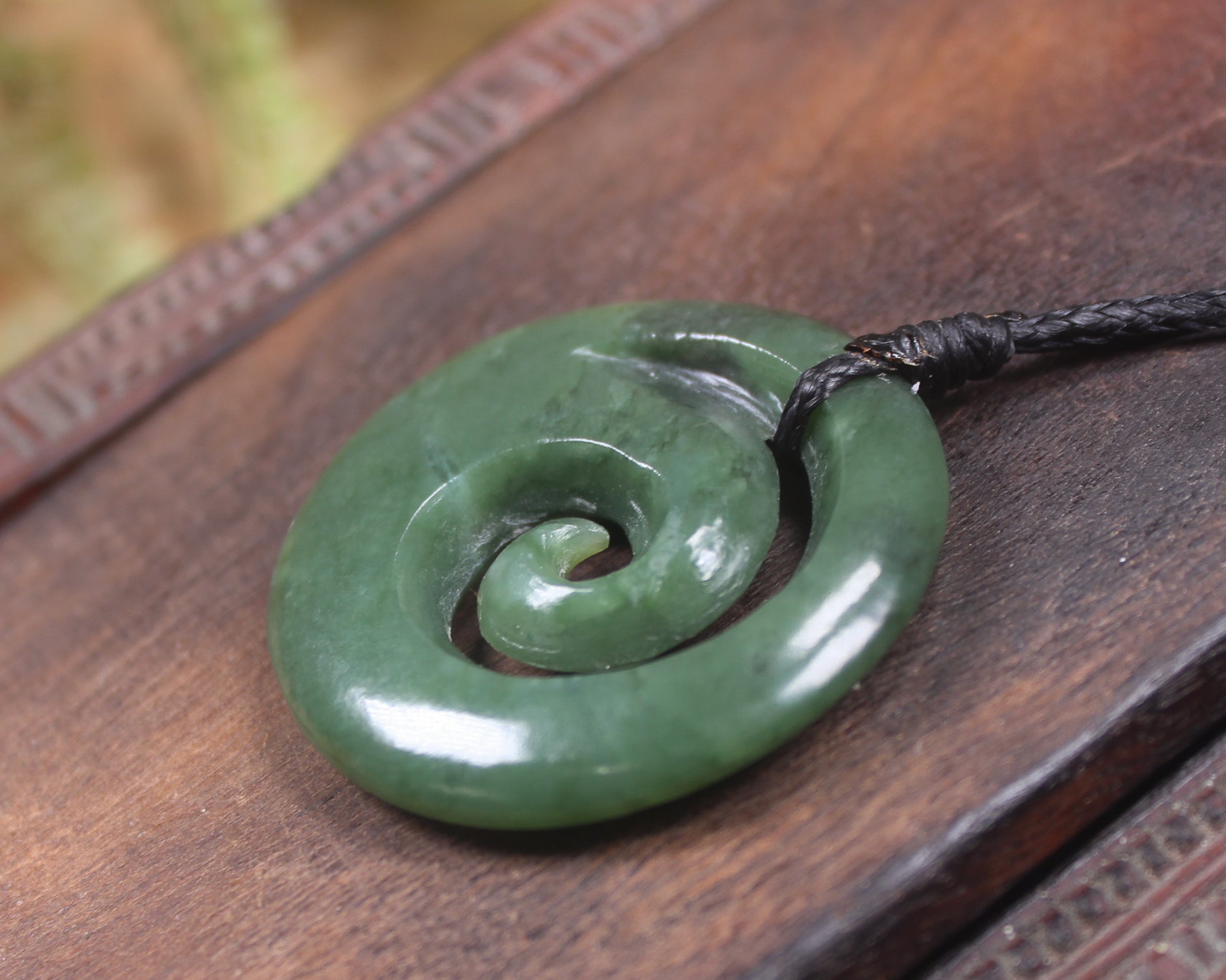 Koru pendant carved from Kawakawa Pounamu - NZ Greenstone