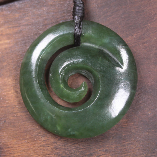 Koru pendant carved from Kawakawa Pounamu - NZ Greenstone