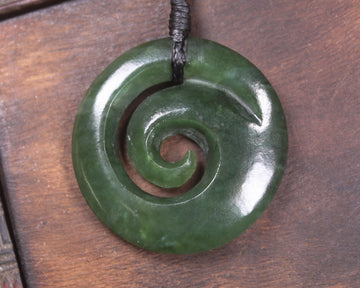 Koru pendant carved from Kawakawa Pounamu - NZ Greenstone