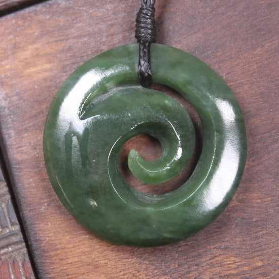 Koru pendant carved from Kawakawa Pounamu - NZ Greenstone