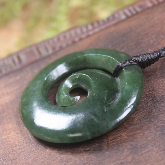Koru pendant carved from Kawakawa Pounamu - NZ Greenstone