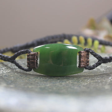 Adjustable cord bracelet with Kawakawa Pounamu