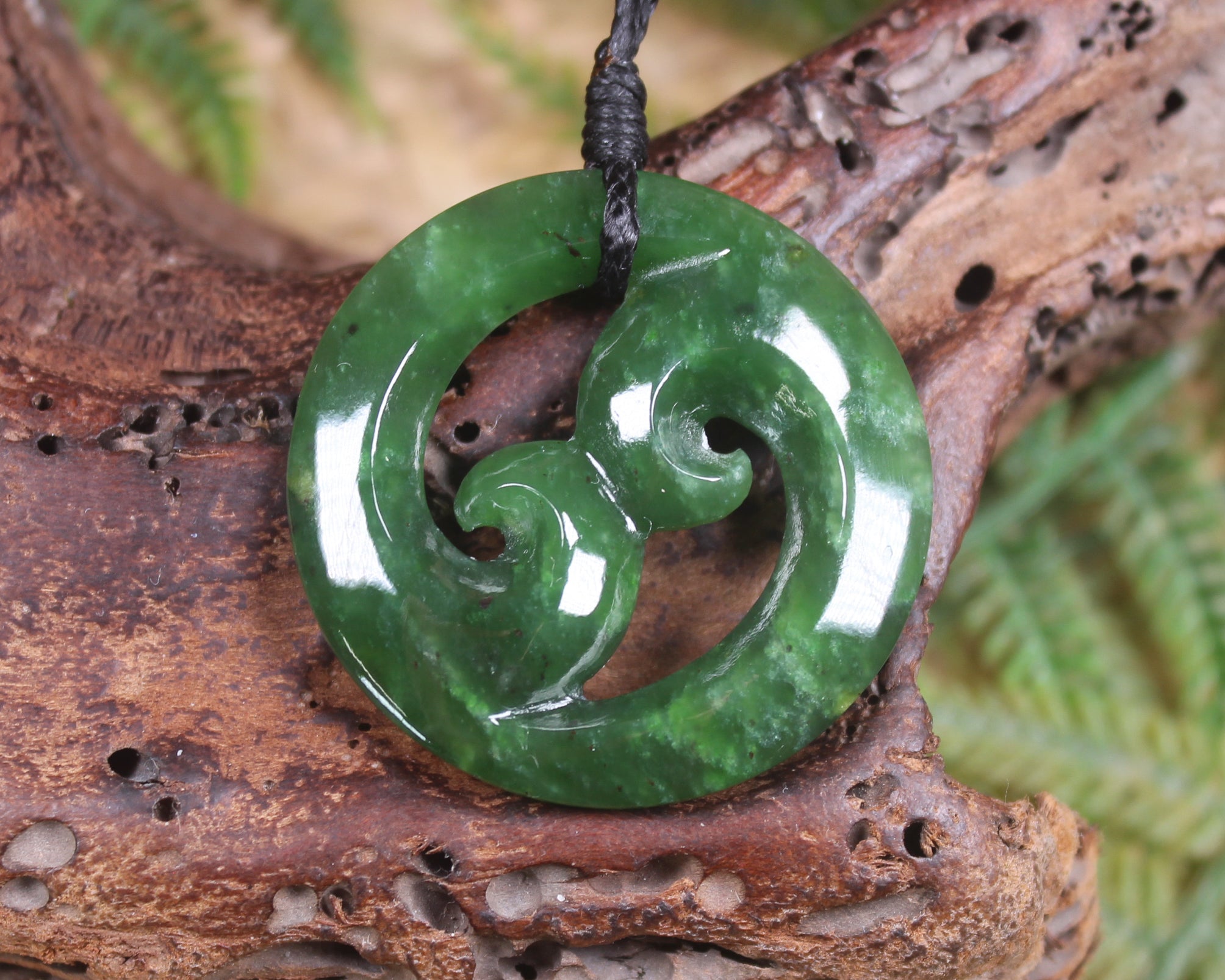 Koru pendant carved from Kawakawa Pounamu - NZ Greenstone